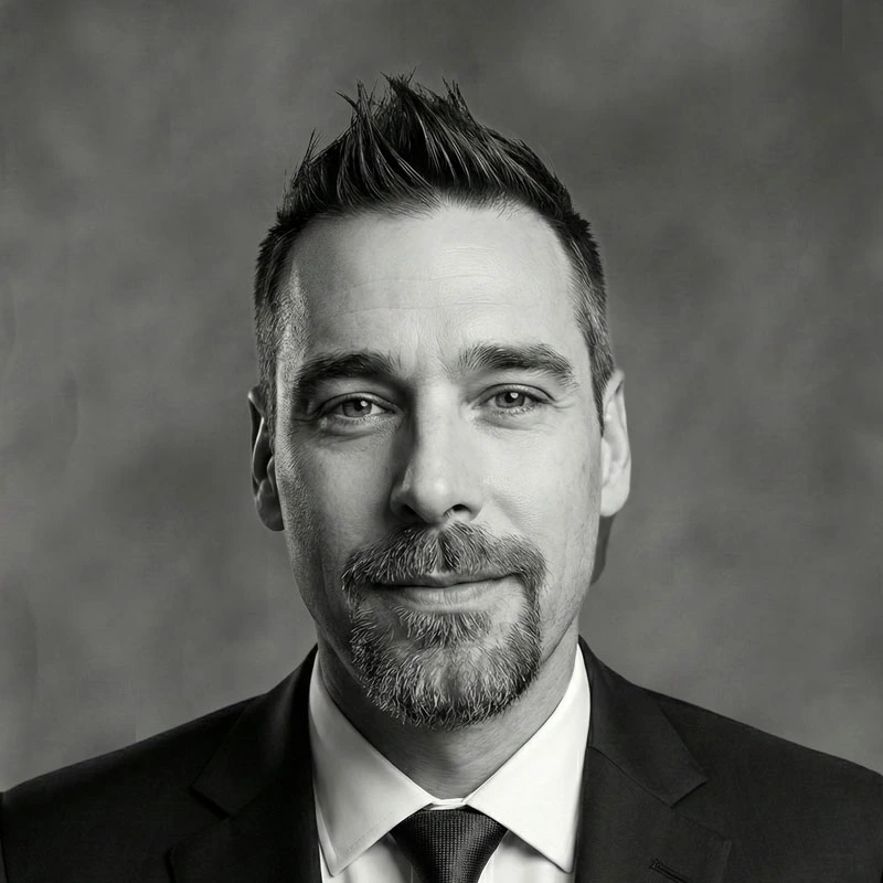 Professional headshot of Rogan Butler